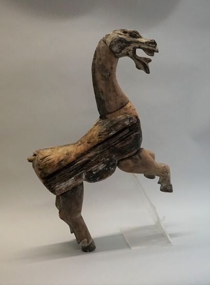 Horse shown prancing in natural wood. Han...