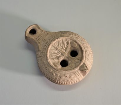 A white earthenware oil lamp, Judaica style....