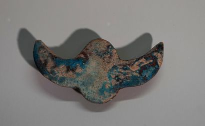 Amulet in the form of a winged beetle. Terracotta...