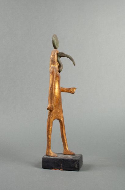 Gilded statuette representing the God Thoth...
