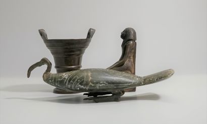 Set of three objects composed of a metal...