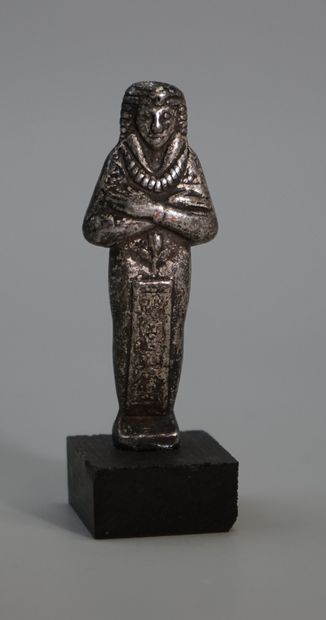 
Double-sided silver-plated copper statuette...