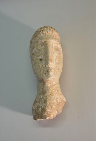 White stone (marble) head in Celtic styl...