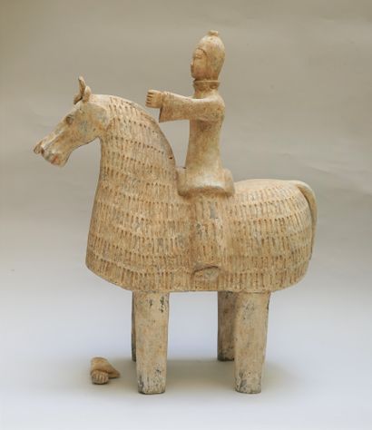 Warrior on a caparisoned horse. Beige and...
