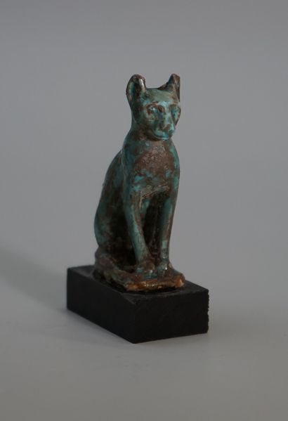Large turquoise earthenware amulet representing...
