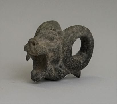 Lion head in light stone (basalt?) Persian...