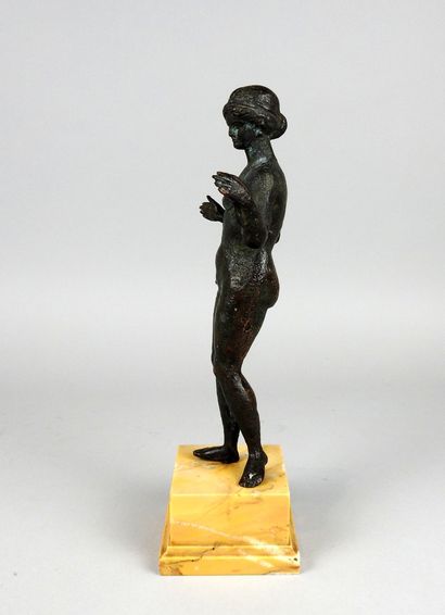 Very large statuette representing Venus holding...