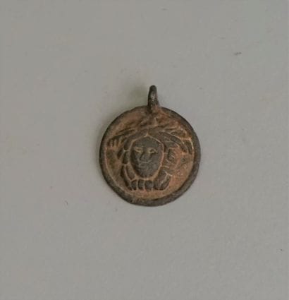 Medallion presenting a gorgon in bronze....