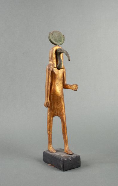 Gilded statuette representing the God Thoth...