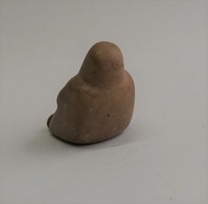 Small stone idol, seated man in late Neolithic...