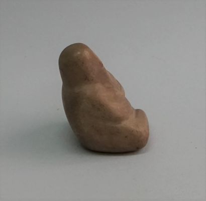 Small stone idol, seated man in late Neolithic...