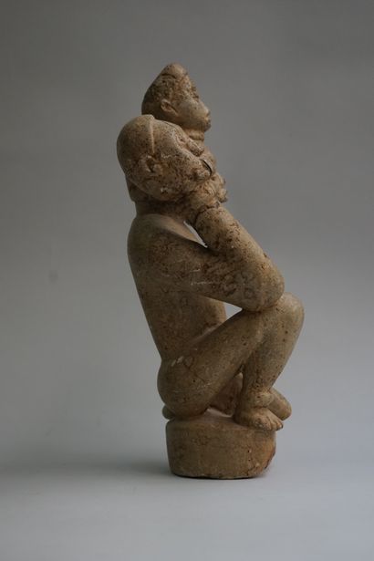 Anthropomorphic figure showing a kneeling...
