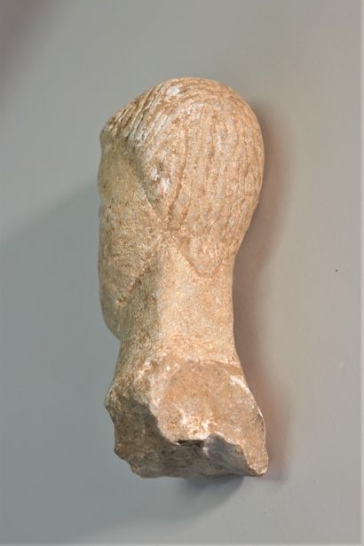 White stone (marble) head in Celtic styl...