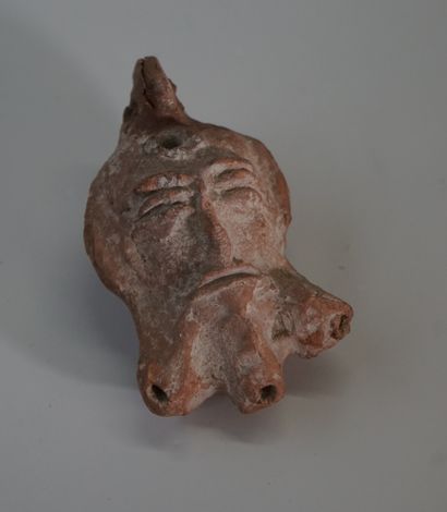 Old oil lamp in terra cotta of anthropomorphic...