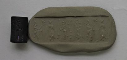 Black stone cylinder seal with pictogram....