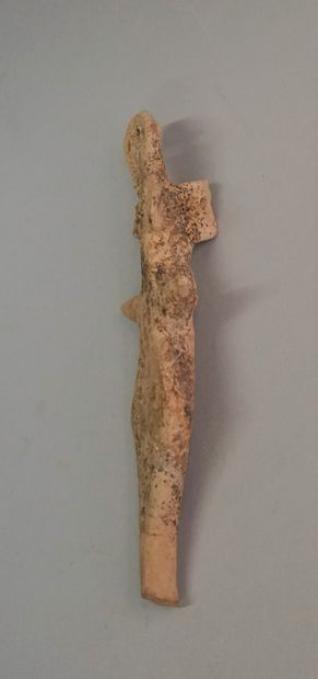 Terracotta idol in the Levantine style. Broken/glued....