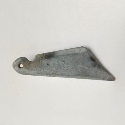Sword blade in calcified copper jade.

Style...