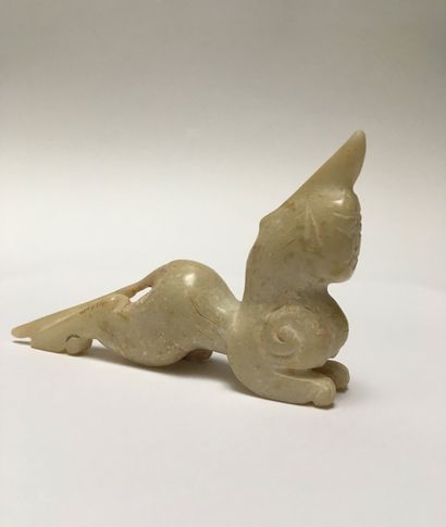 Mythical animal in beige jade. Body of a...