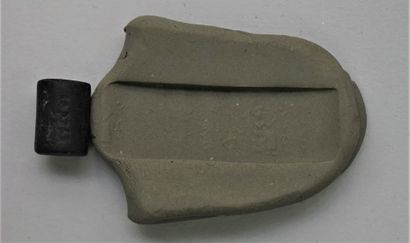 Black stone cylinder seal with small animated...
