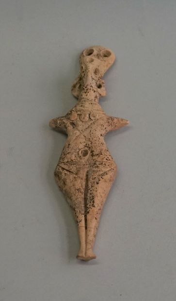 Terracotta idol in the Levantine style. Broken/glued....