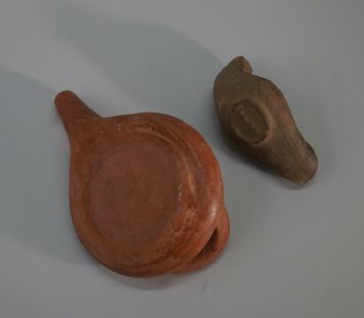 Set of two terracotta oil lamps in the Roman...