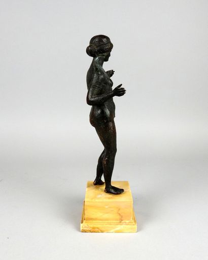 Very large statuette representing Venus holding...
