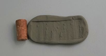Cylinder seal in brown stone, wear. 2.9x...