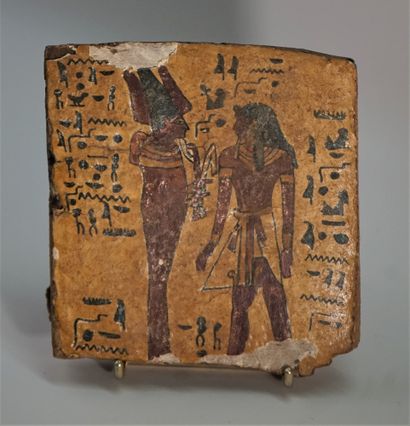 Fragment of a wooden sarcophagus representing...