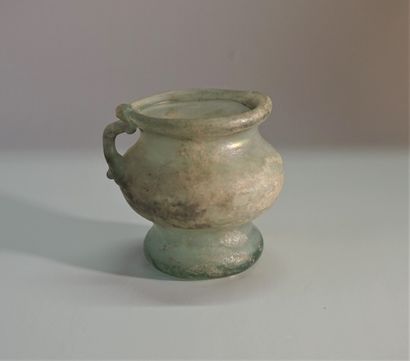 Roman style iridescent glass vase with handle....