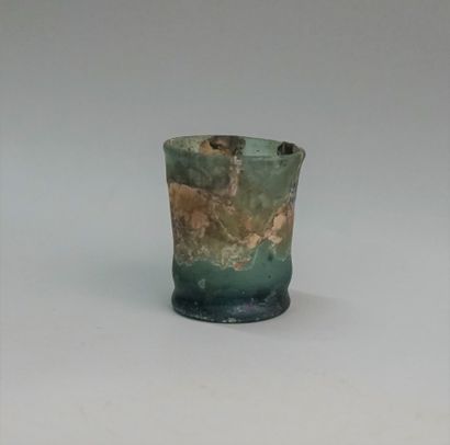 Iridescent glass goblet. Islamic style. Reglued,...