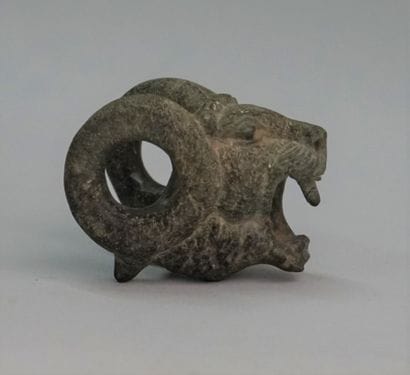 Lion head in light stone (basalt?) Persian...