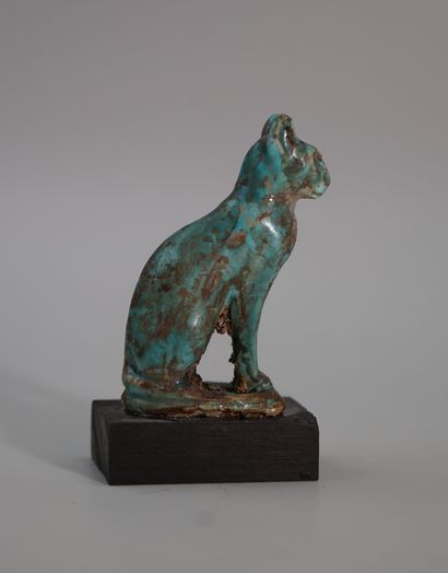 Large turquoise earthenware amulet representing...