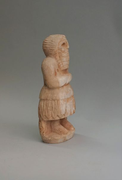 Statuette of a priest in stone (alabaster?),...