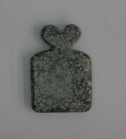 Idol with big eyes in green and black granite...