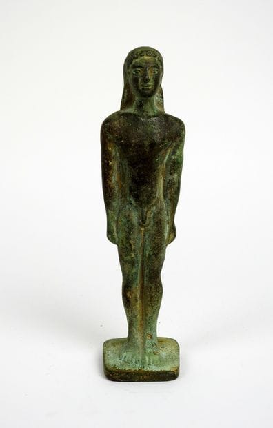 Large kouros with arms at the side of the...