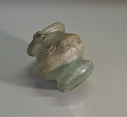 Roman style iridescent glass vase with handle....