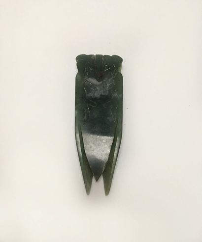 Cicada in dark green jade. The eyes, wings...
