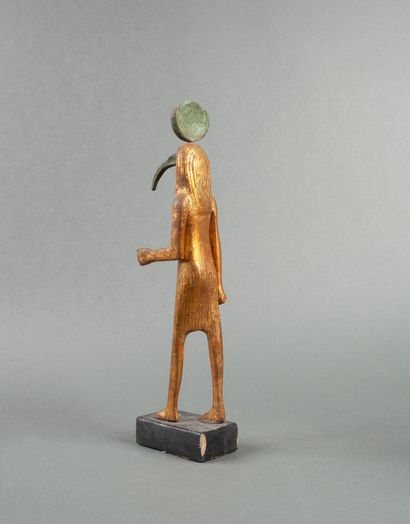 Gilded statuette representing the God Thoth...