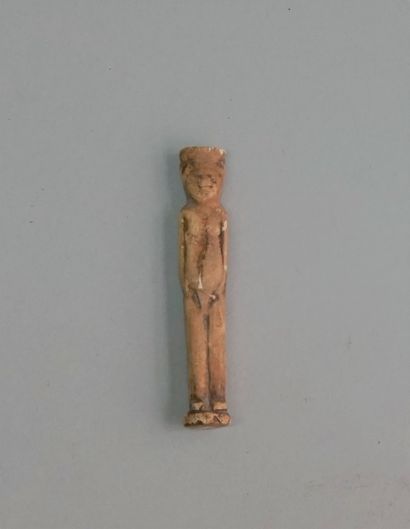 Small bone divinity of the caryatid type....