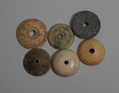 Lot of stone or bone spindle whorls. Middle...