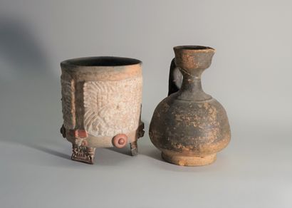 Set of two terracotta receptacles, one in...