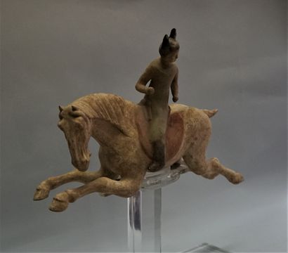 Polychrome terracotta polo player. Reassembled...