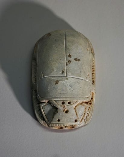 Beige hardstone scarab, incised with hieroglyphs...