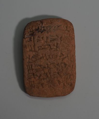 Clay tablet engraved with pictograms on both...