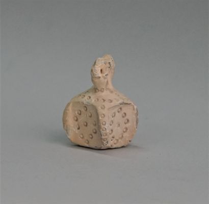 Square idol in soft stone with white slip....