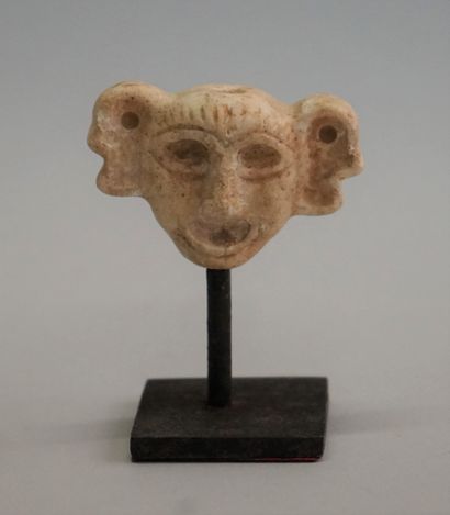 White stone mini idol face, levantine style....