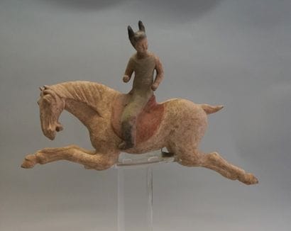 Polychrome terracotta polo player. Reassembled...