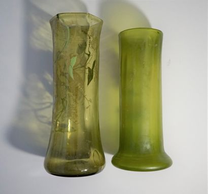 Two green glass cylindrical vases with flattened...