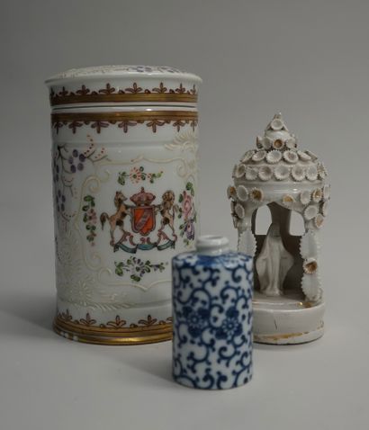 Porcelain set including: a covered pot with...