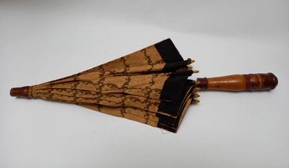 Small sunshade with turned wood handle and...